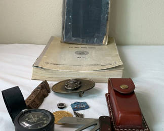 Lot 113: Naval diving manuals and maritime memorabilia