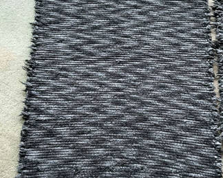 Lot 106: Pair Of Black And Grey Rag Throw Rugs