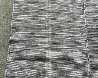 Lot 107: Pair Of Grey And Tan Throw Rugs