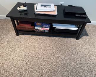 Black coffee table with shelf