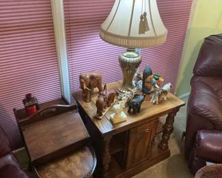 End table with elephant figurines