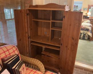 Wood storage cabinet.