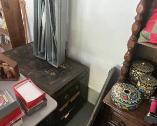 Old trunk, metal sawhorses