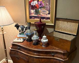 Floral oil painting on canvas by Howard Carr, 3-drawer Bombay chest, Cloisonne' vases, urns, antique tea box, and brass floor lamp