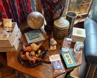 Another view of the pipes, globe, Irish coffee mugs (4), Pewabic pottery tiles, and ceramic tobacco jar and beer stein