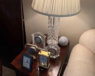 Baker drop-leaf mahogany side table (matched set of 2 available) shown with Waterford lamp, clocks and more clocks
