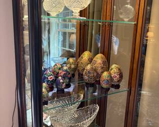 Glass etagere case with 3-shelves - lit, and shown with crystal decanter, closoinee eggs and Waterford oval pedestal dish