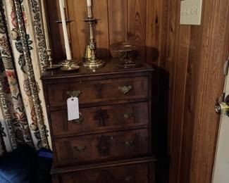 Not the best picture, but this is a very pretty little VTG chest of drawers with brass hardware