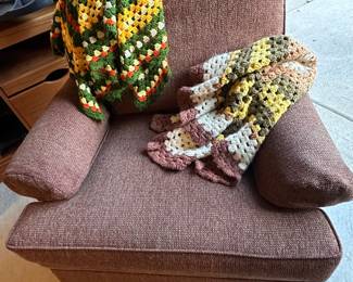 Swivel chair with afghans