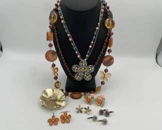 Flower Themed Jewelry Collection with Necklaces Earrings and Brooch