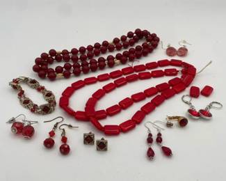 Collection of Red Jewelry including Necklaces Earrings and Bracelet