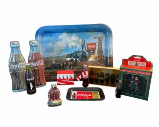 A Variety Of CocaCola Collectibles
