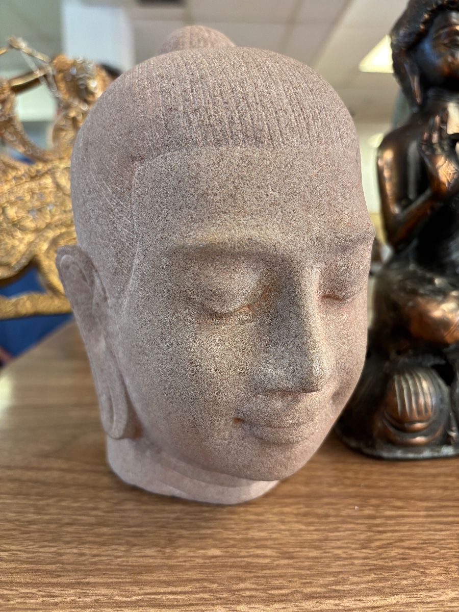 Grey handcarved sandstone Buddha head