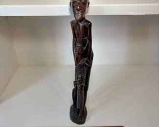 C73 - $45. African Tribal Hand Carved Mother and Children. Measures 17" Tall.