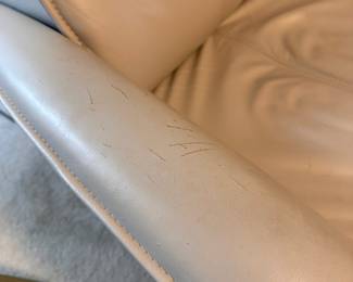C6 - $200. Fjords Swivel, Rocking, Power Recliner. Off white / Grey Color. *HAS CAT DAMAGE* Measures 32" wide x 31"deep x 40" tall. (Seat is 21" wide - feels narrow) No holes or rips but significant scratches on the arms and back - see photos! If you have cats and this is going to happen anyways this is a great price for a leather power recliner.