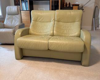 C5 - $300. Fjords Leather Reclining Loveseat. *HAS CAT DAMAGE* Measures 54" x 30" x 40" tall. No holes or rips but significant scratches on the arms and back - see photos! If you have cats and this is going to happen anyways this is a great price for a high quality leather couch!