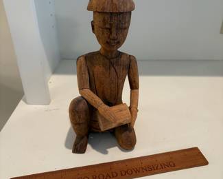 C66 - $15. Vintage Asian Bali Indonesian Hand Carved Wood Figure. Measures 10.25" Tall. The hat has a chip.