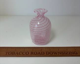 C95 - $20. White Latticino Vace. Pink/White/Clear swirls. Measures 4.25" Tall