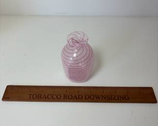 C95 - $20. White Latticino Vace. Pink/White/Clear swirls. Measures 4.25" Tall