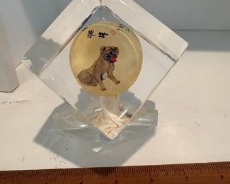 C68 - $40. Chinese reverse painted paper weight on stand. Small chip on the stand. Measures as a 3" cube. Base adds .75".