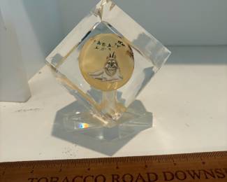 C68 - $40. Chinese reverse painted paper weight on stand. Small chip on the stand. Measures as a 3" cube. Base adds .75".