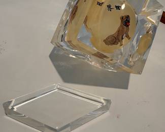 C68 - $40. Chinese reverse painted paper weight on stand. Small chip on the stand. Measures as a 3" cube. Base adds .75".