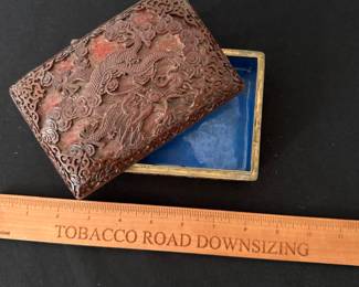 C64 - $75. Chinese Cinnabar Lacquered Box with Blue Enamel Interior. Measures 5.75" x 3.75" x 2.25" tall.