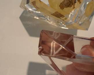 C68 - $40. Chinese reverse painted paper weight on stand. Small chip on the stand. Measures as a 3" cube. Base adds .75".