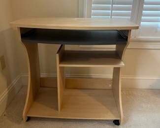C23 - $15. Small rolling office desk with pull out keyboard tray. No issues. Measures 32.5" wide x 19.5" deep x 30.75" tall.