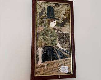 C110 - $35. Framed Majolica Tile with Lady. Measures 9.25" x 17.25" framed.