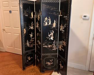 C168 - $175. 4 Panel Screen / Room Divider with soapstone figures. In fair condition - see photos. Slight water damage to one leg. Has been wall mounted but stands freely!