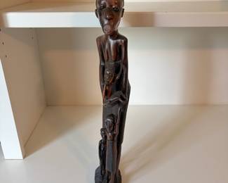 C73 - $45. African Tribal Hand Carved Mother and Children. Measures 17" Tall.
