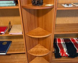 C1 - $200. 5 Piece Bookcase. Shelves are all adjustable. Assembled as it they measure 118.5" across. 2 smaller sections are 19.75" wide x 11.5" deep x 83" tall. 2 larger bookcases are 30.25" wide x 11.5" deep x 83" tall. Center piece could be used on an end or as is. Comes out from the corner 11". Across the front is 16.25".