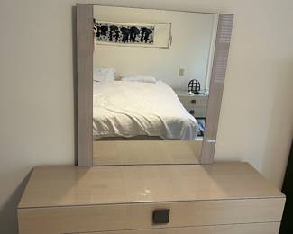 C20 - $350. Dresser & Mirror from Ambiente Modern Furniture. ALF Italian Designs "Mont Blanc" series. Measures 62.5" x 20" x 30.25" tall. Mirror is 39.5" x 42" tall. Moves in 2 pieces. Opens as 3 long drawers but they're divided in the middle. All drawers slide - very good, gently used condition.