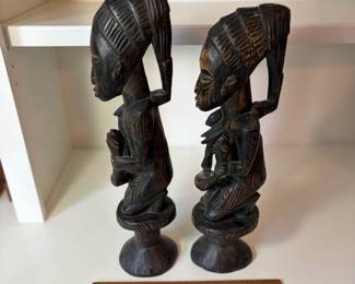 C75 - $40. Pair of African Hand Carved Folk Art Man and Woman. Measures 17.5" Tall