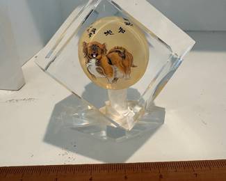 C68 - $40. Chinese reverse painted paper weight on stand. Small chip on the stand. Measures as a 3" cube. Base adds .75".