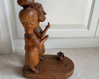C60 - $20. Tribal Hand Carved Wood Couple. Measures 6" W x 10" D x 14.5" Tall. One piece of the pot is detached but can easily be glued back on.