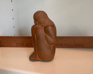 C53 - $10. Hand Carved Weeping Man. Measures 4.25" Tall