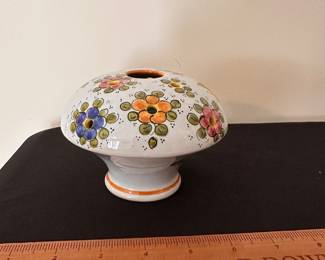 C148 - $20. Deruta Floral Frog Vase. Measures 5.5" x 4" tall.