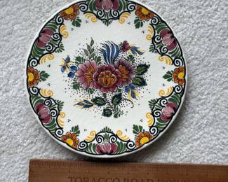 C132 - $25. J Pitt Holland Plate.