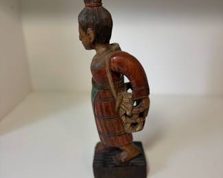 C74 - $30. Thai Hill Tribe Hand Carved Folk Art Woman With Basket. Measures 3" W x 12.25" Tall