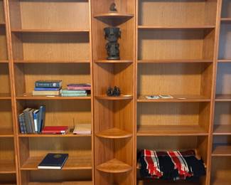 C1 - $200. 5 Piece Bookcase. Shelves are all adjustable. Assembled as it they measure 118.5" across. 2 smaller sections are 19.75" wide x 11.5" deep x 83" tall. 2 larger bookcases are 30.25" wide x 11.5" deep x 83" tall. Center piece could be used on an end or as is. Comes out from the corner 11". Across the front is 16.25".