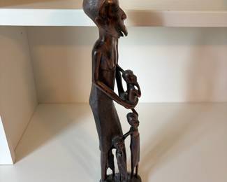C73 - $45. African Tribal Hand Carved Mother and Children. Measures 17" Tall.