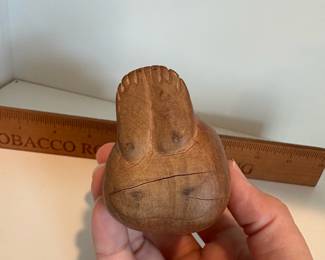 C53 - $10. Hand Carved Weeping Man. Measures 4.25" Tall