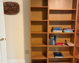 C1 - $200. 5 Piece Bookcase. Shelves are all adjustable. Assembled as it they measure 118.5" across. 2 smaller sections are 19.75" wide x 11.5" deep x 83" tall. 2 larger bookcases are 30.25" wide x 11.5" deep x 83" tall. Center piece could be used on an end or as is. Comes out from the corner 11". Across the front is 16.25".