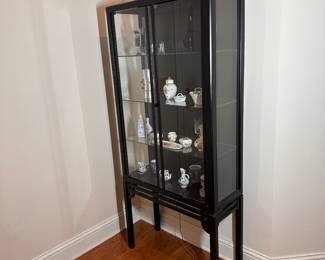 C26 - $550. 2 door display cabinet from Skaraborgs Mobler. Made in Sweden. Measures 31.5" x 13.5" x 69" tall. 3 adjustable glass shelves.