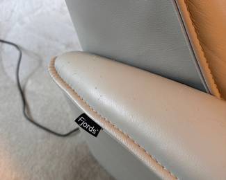 C6 - $200. Fjords Swivel, Rocking, Power Recliner. Off white / Grey Color. *HAS CAT DAMAGE* Measures 32" wide x 31"deep x 40" tall. (Seat is 21" wide - feels narrow) No holes or rips but significant scratches on the arms and back - see photos! If you have cats and this is going to happen anyways this is a great price for a leather power recliner.