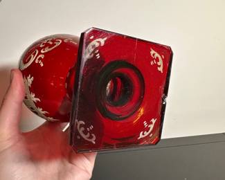 C28 - $15. Cut to Clear Red Glass. Has chip on the underside of the base. Castle carved on one side and a deer on the other.
