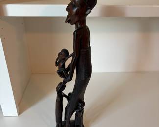 C73 - $45. African Tribal Hand Carved Mother and Children. Measures 17" Tall.