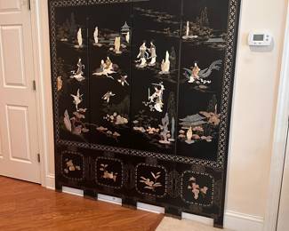 C168 - $175. 4 Panel Screen / Room Divider with soapstone figures. In fair condition - see photos. Slight water damage to one leg. Has been wall mounted but stands freely!